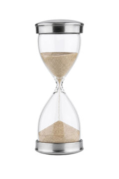 Classic transparent glass hourglass with sand flowing through its narrow neck, featuring brushed metal caps, isolated on a clean white background