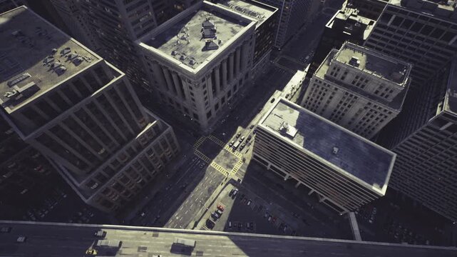 Aerial chicago geometric block pattern revealing symmetrical rooftops and streets, repetitive facades, muted palette, minimal vehicular presence, quiet urban