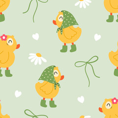 Obraz premium Cute yellow duck vector seamless pattern with green headscarf, rain boots, daisies, and hearts on soft sage green background for nursery decor, baby clothing, and textile design.