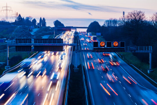 Germany, Baden-Wuerttemberg, Autobahn A8 near Wendlingen in the evening, light trails