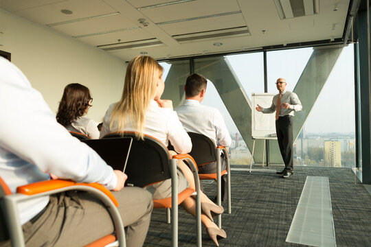 Group of businesspeople attending a seminar