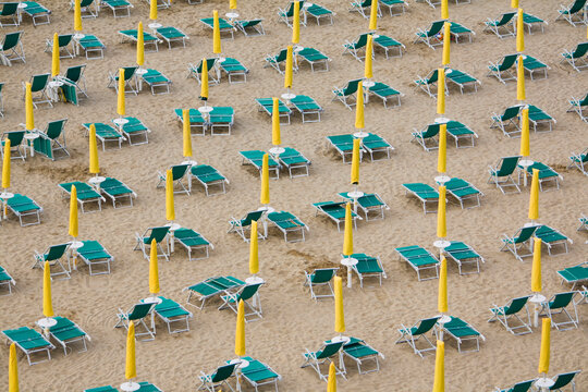 Italy, Jesolo, Deserted beach with deck chairs, elevated view