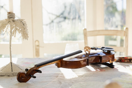 violin resting on table 