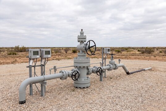 Metal pipeline valve system on gravel ground