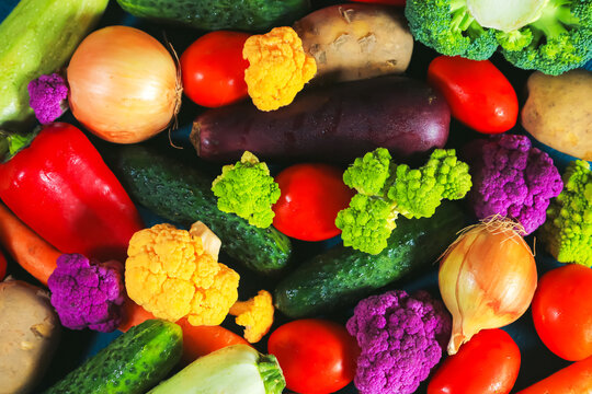 Fresh, shiny vegetables of different varieties. Top view. Food background.