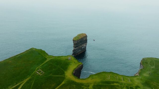 Aerial arch around Dun Briste sea stack at Downpatrick Head in County Mayo Ireland Part 1