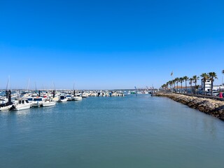 view of the Cano de Sancti Petri and the Puerto Deportivo de Sancti Petri marina with many boats between Cadiz, San Fernando and Chiclana de la Frontera, Andalusia, Spain © keBu.Medien
