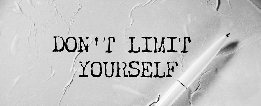Don't limit yourself - writing on torn paper.