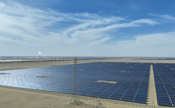 Vast Solar Power Plant with Transmission Tower in Gobi Desert