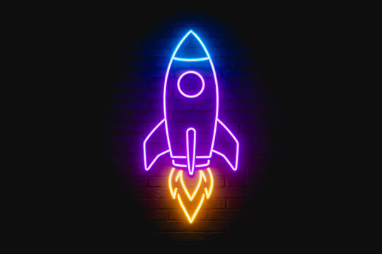 A glowing neon rocket icon launching with flame effects, set against a dark textured brick wall background.