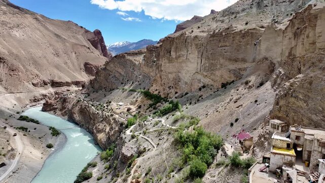 Zanskar, India : Panoramic footage of beautiful landscape and Tsarap river and valley where Phuktal gompa, cliffside monastery built in natural cave of Zanskar in Ladakh, India