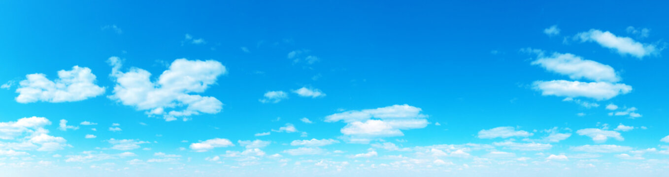 Blue Sky background with tiny Clouds. Panorama background