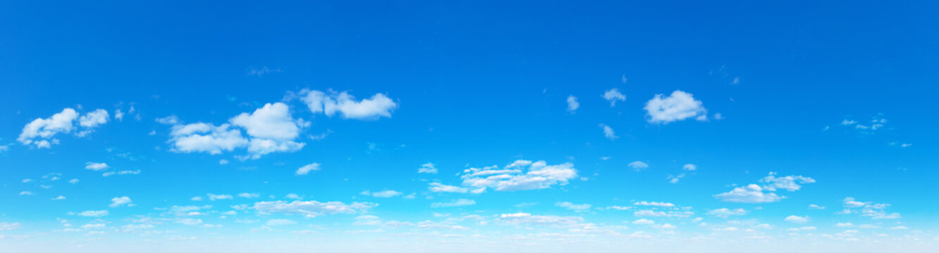 Blue Sky background with tiny Clouds. Panorama background