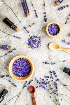 Essential oil and lavender salt with flowers top view