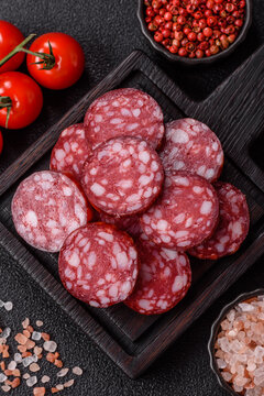 Slices of smoked salami for sandwiches or a lunch spread. Salami slices