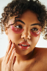 Confident young woman embraces elegance and beauty in a chic moment of self care