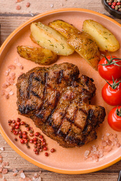 Grilled beef or pork steak seasoned with salt and allspice. Grilled steak