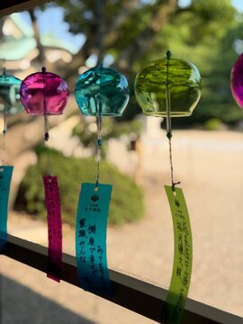 Colorful glass wind chimes hanging garden