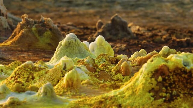 Aerial view of the colorful sulfur deposits and salt formations at the Dalol geothermal area in Dalol, Afar, Ethiopia.