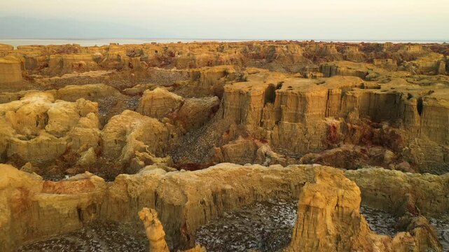 Aerial view of the colorful salt formations and mineral deposits of the Dallol geothermal area in Dalol, Afar, Ethiopia.