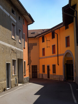 Old houses along via Trieste in Cividate al Piano, Bergamo province, Italy