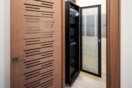 Modern home server room with an open network server rack cabinet 