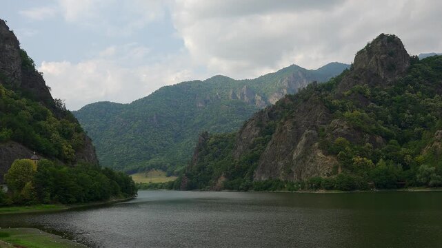 Olt River and forested mountains near Cozia Monastery in Calimanesti, Valcea County, Romania