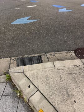 Directional arrow markings on pavement close up
