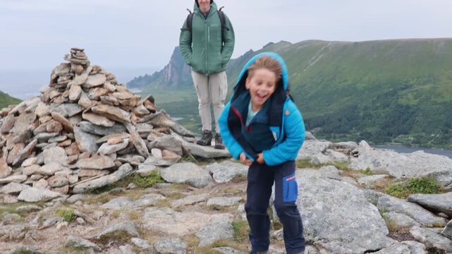 Mount Matind hike, family with children and pet dog, hiking Matinden peak summertime
