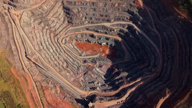 High-Angle Perspective of Massive Extraction Pit and Iron-Rich Earth in Leicestershire