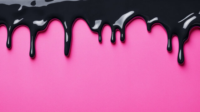 thick black glossy paint dripping down on pink paper background creating a bold abstract pattern