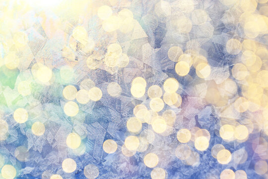 Golden New Year bokeh, abstract background with blurred circles.