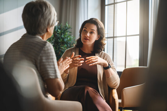 Therapist and Client Engaged in Emotional Counseling Session