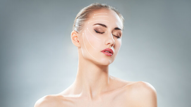 Beautiful Woman with Face Lifting Lines . Cosmetic Treatment and Anti-Aging Concept