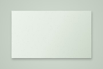 Fototapeta premium Minimalist rectangular paper sheet on a solid sage green background