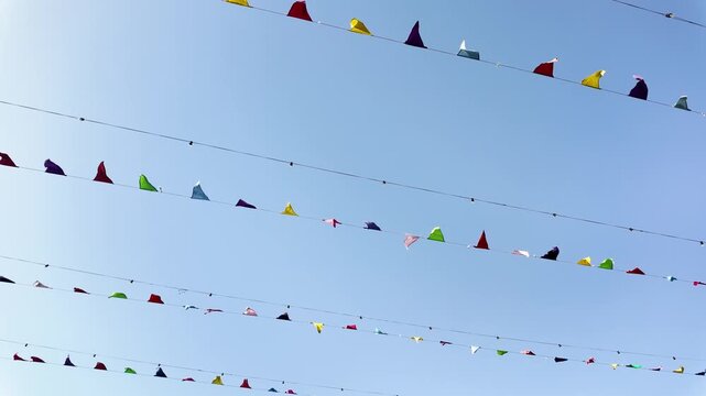 Colorful bunting flags moving in the wind