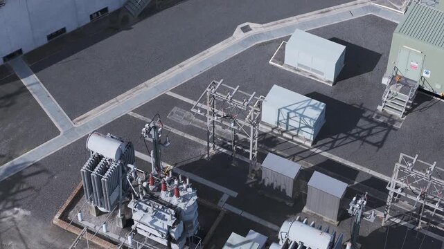 Ferntree Gully, Victoria, Australia - 24 August 2026: Aerial view of Ferntree Gully Zone Substation with electrical transformers and metal structures.