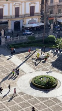 High angle view of the historic square and gardens from the roof of Palermo Cathedral. Scenic view of Piazza della Cattedrale from the rooftop, Sicily, Italy.