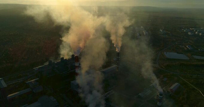 Aerial View. Emission to the Atmosphere from Industrial Pipes. Smokestack Chimneys. Industrial Background of Metallurgical Production Factory