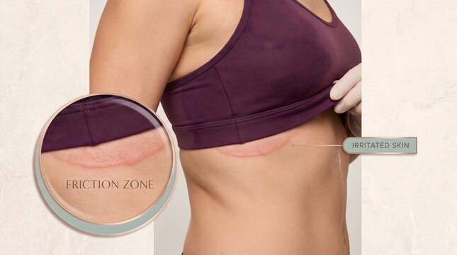 High-waisted seamless shapewear with friction zone labels. Woman wearing purple waist cincher with targeted compression areas for smoothing and support