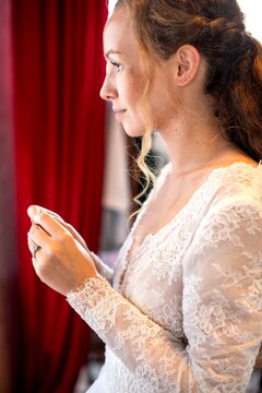 Bride preparing with elegant grace.