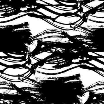 Seamless pattern from textured black strokes on white paper