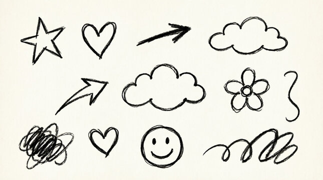 Set of black hand-drawn doodle design elements isolated on light background.