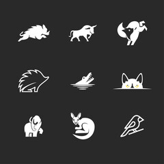 Fototapeta premium Collection of modern animal logos and minimalist icons. Features wild boar, bull, fox, hedgehog, alligator, cat, mammoth, kangaroo, and bird. Graphic design elements for various uses.