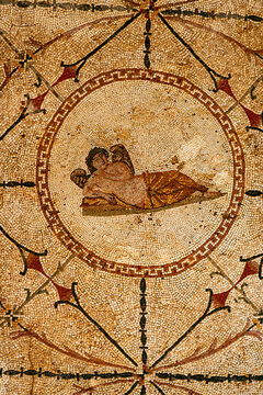 Risan, Kotor Municipality, Montenegro - 05 July 2005: View of the ancient Roman mosaic depicting the god Hypnos, featuring intricate stone tiles and a decorative geometric border.