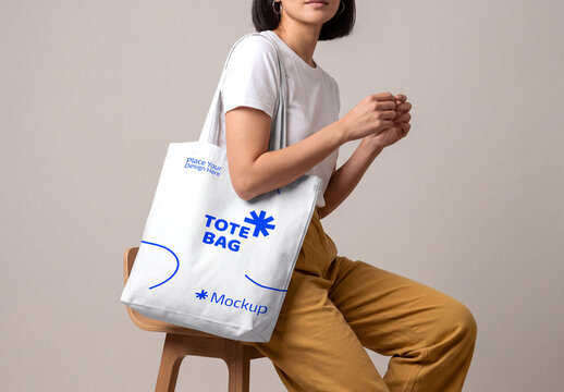 Woman Sitting with Tote Bag Mockup