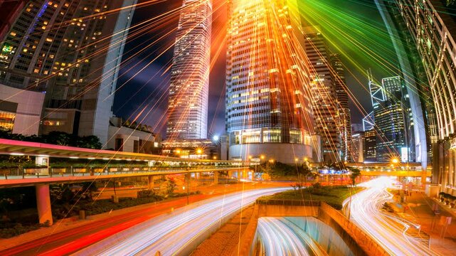 Dynamic urban cityscape with vibrant light trails and motion blur
