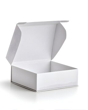 Clean white cardboard gift box with magnetic flap closure, premium packaging isolated on white background