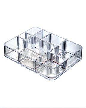 Clear acrylic cosmetic organizer tray with multiple sections, beauty storage product isolated on white background