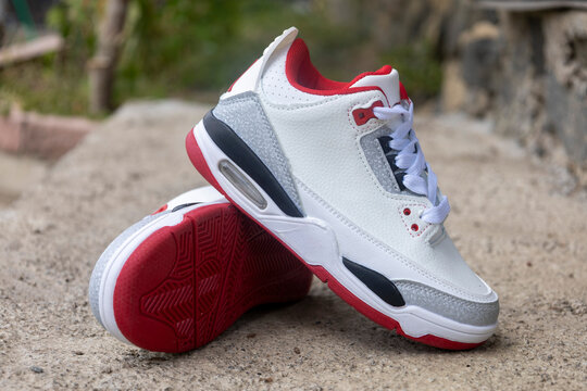 White red leather sneakers pair